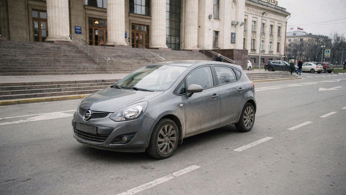 Compact rental car parked outside the central railway station in Kyiv